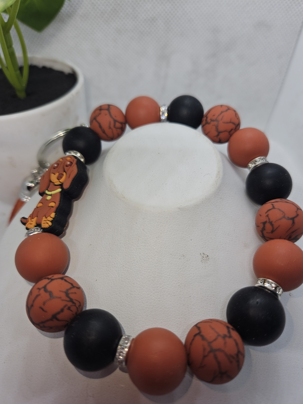 Orange & Black Dog Charm Beaded Wristlet